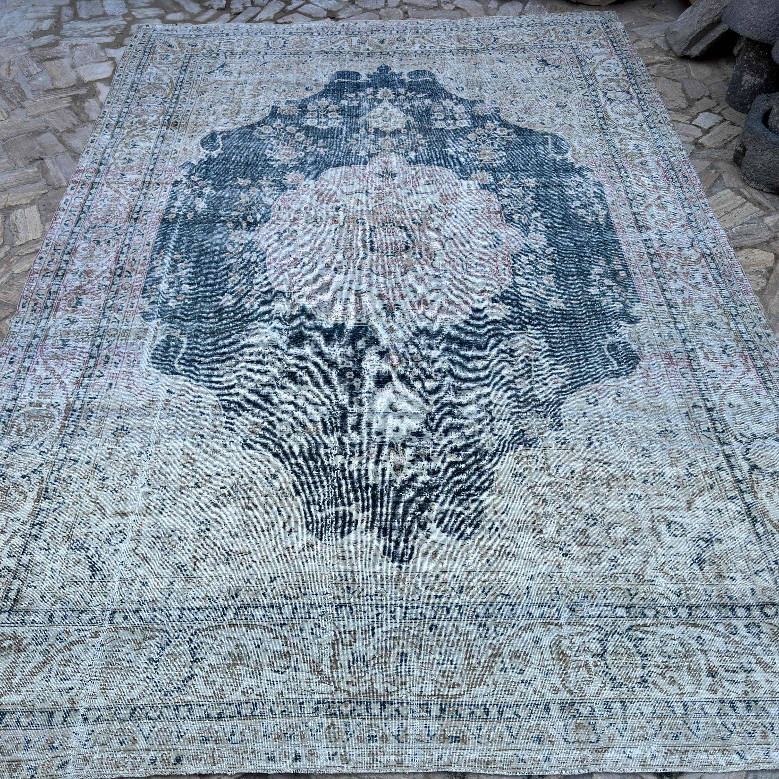 Blue 10' x 13' turkish large rug in wool and cotton, shown on the floor.