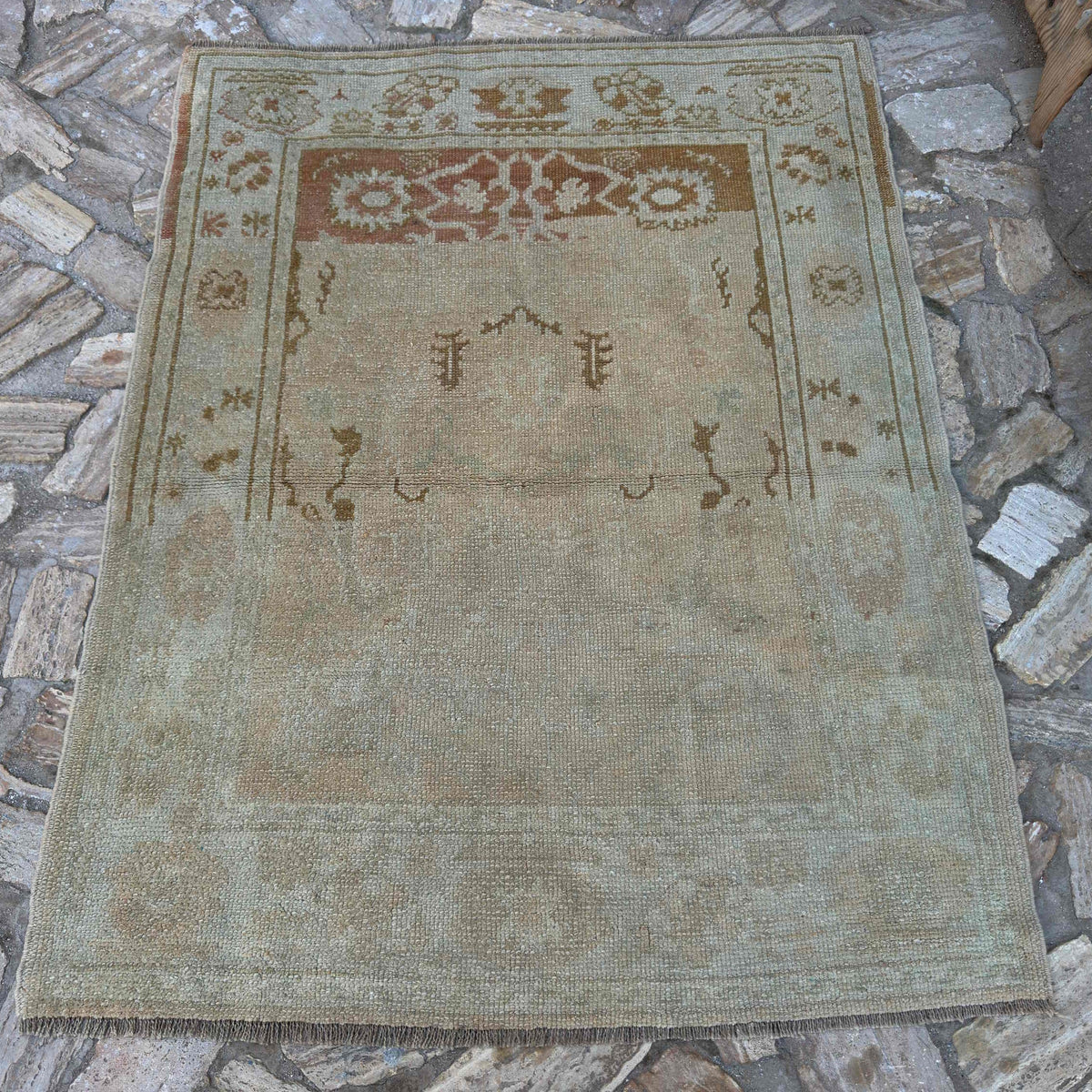 Beige 4' x 5' turkish oushak rug in wool and cotton, shown on the floor.