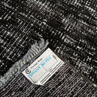 1970s gray turkish overdyed rug with overdyed design, hand-knotted weave and low pile.