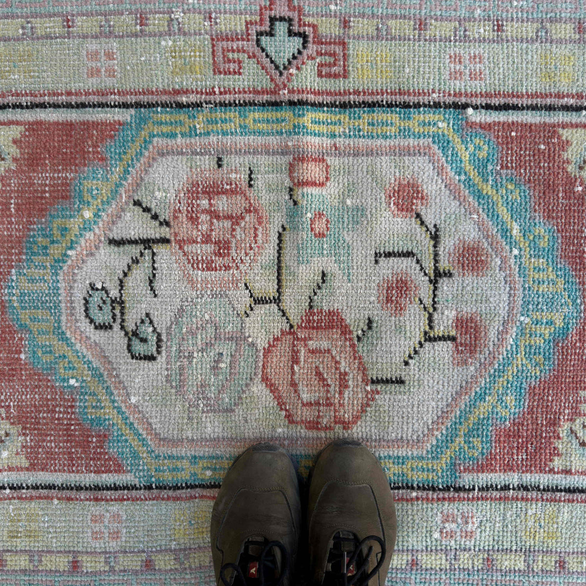 1970s red turkish rug with traditional design, hand-knotted weave and low pile.