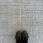 1970s beige turkish rug with neutral design, hand-knotted weave and low pile.