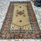 Beige 6' x 10' turkish rug in wool and cotton, shown on the floor.