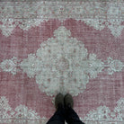 1970s red turkish rug with medallion design, hand-knotted weave and low pile.