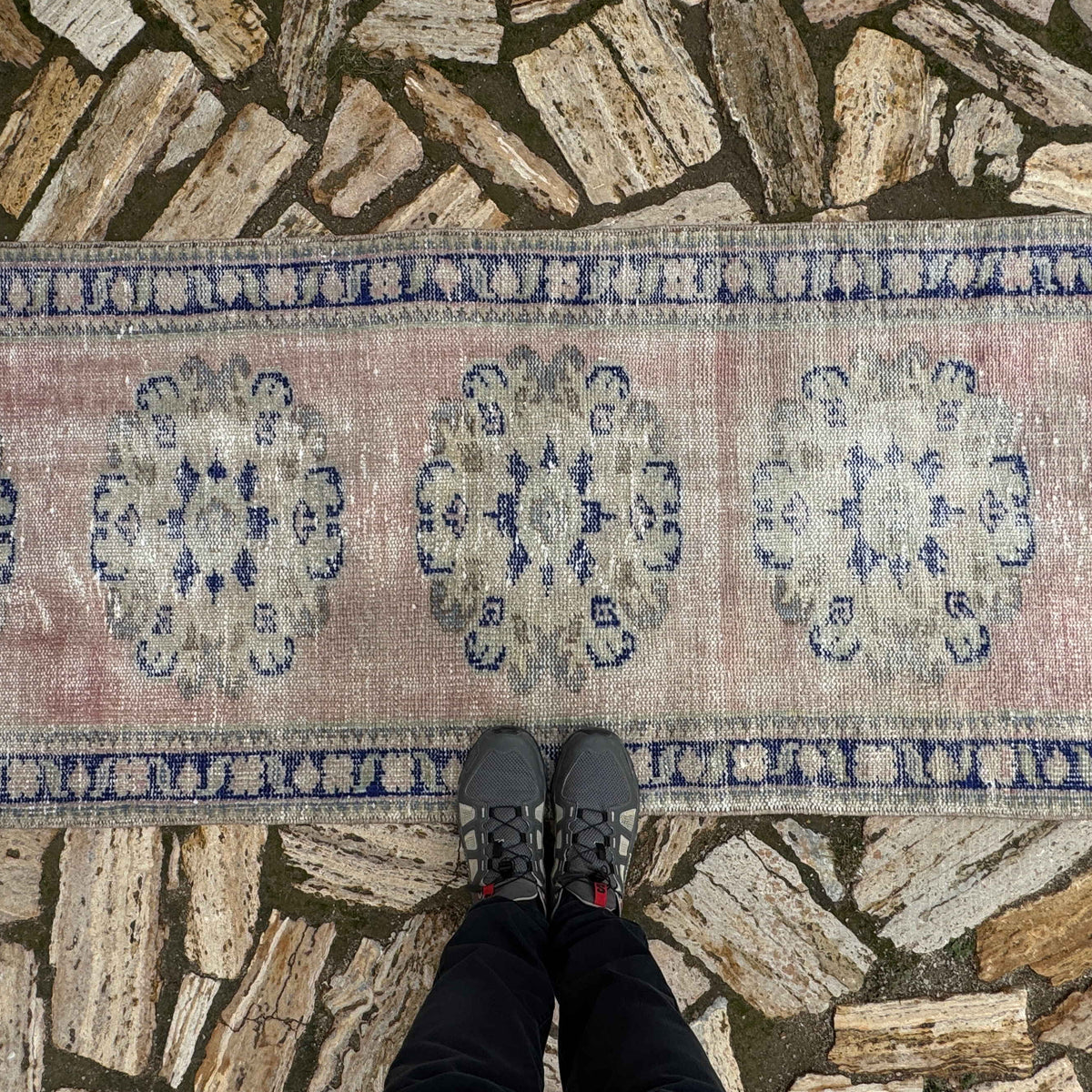 1970s pale pink turkish runner rug with medallion design, hand-knotted weave and low pile.