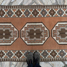 1970s pale orange turkish runner rug with traditional design, hand-knotted weave and low pile.