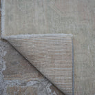 1970s pale pink turkish runner rug with traditional design, hand-knotted weave and low pile.