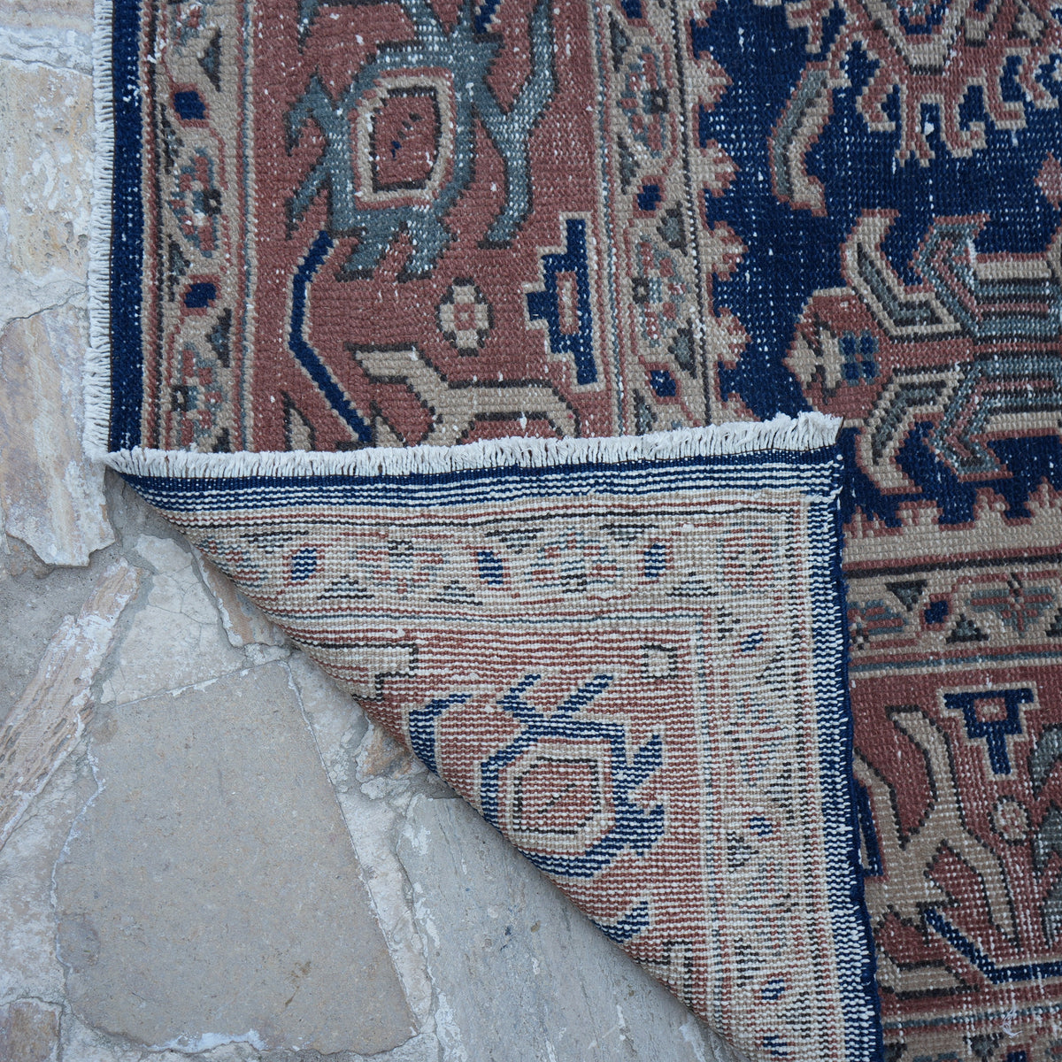 1970s blue Turkish unique vintage oushak rug with traditional design, hand-knotted weave and low pile.