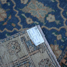 Blue 5' x 9' Turkish unique vintage rug from the 1970s with geometric design.