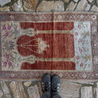 1970s red vintage Turkish anatolia rug with traditional design, hand-knotted weave and low pile.