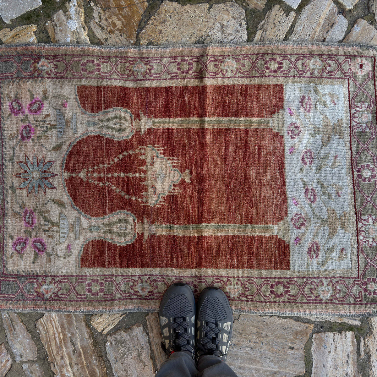 1970s red vintage Turkish anatolia rug with traditional design, hand-knotted weave and low pile.