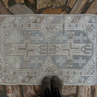 1970s pale blue vintage Turkish anatolian rug with neutral design, hand-knotted weave and low pile.