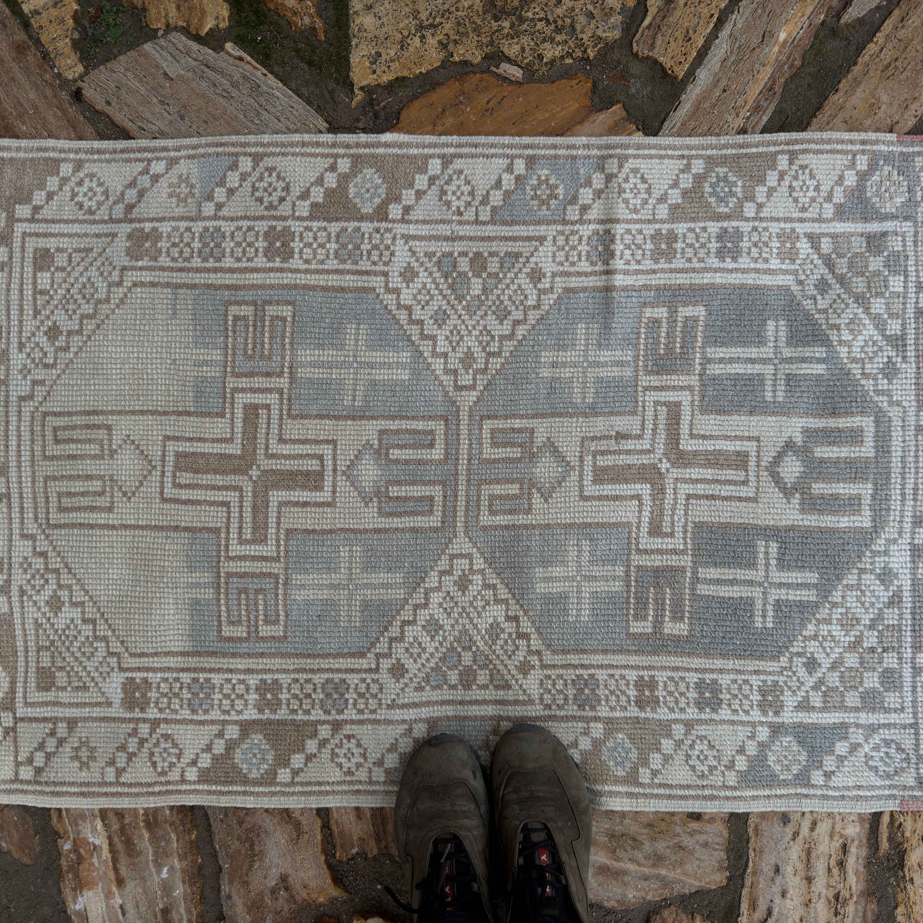 1970s pale blue vintage Turkish anatolian rug with neutral design, hand-knotted weave and low pile.