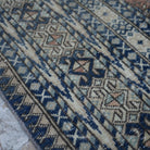Pale Orange 6' x 9' vintage Turkish anatolian rug in wool and cotton, shown on the floor.