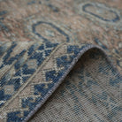 Additional view of the pale orange vintage Turkish anatolian rug, hand-knotted in wool and cotton.