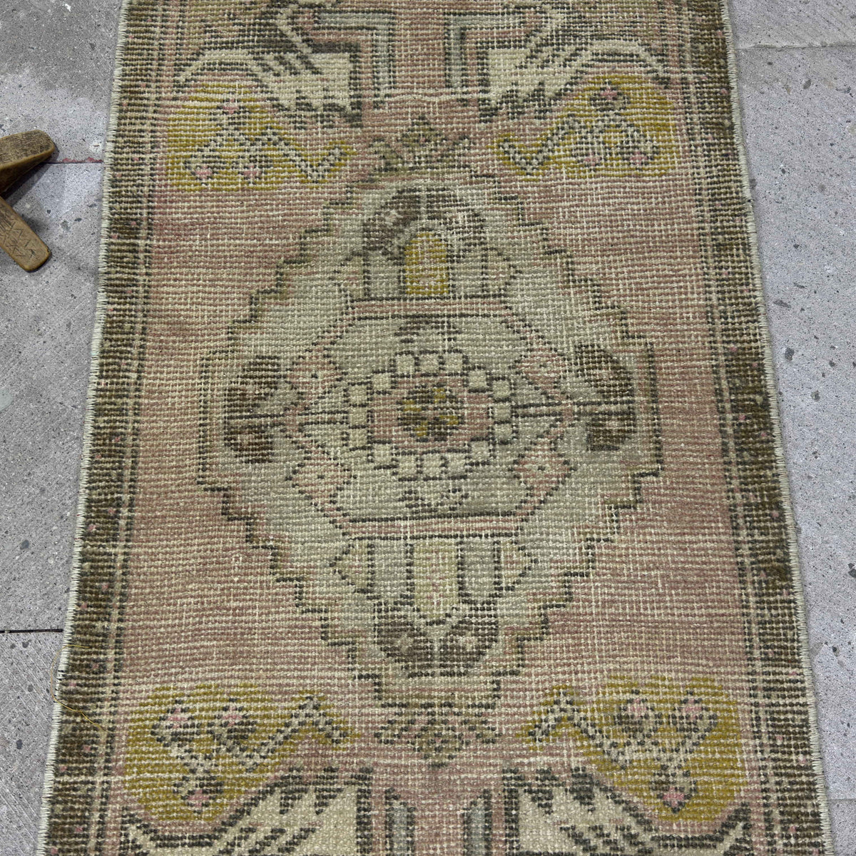 1970s red vintage Turkish area carpet with traditional design, hand-knotted weave and low pile.