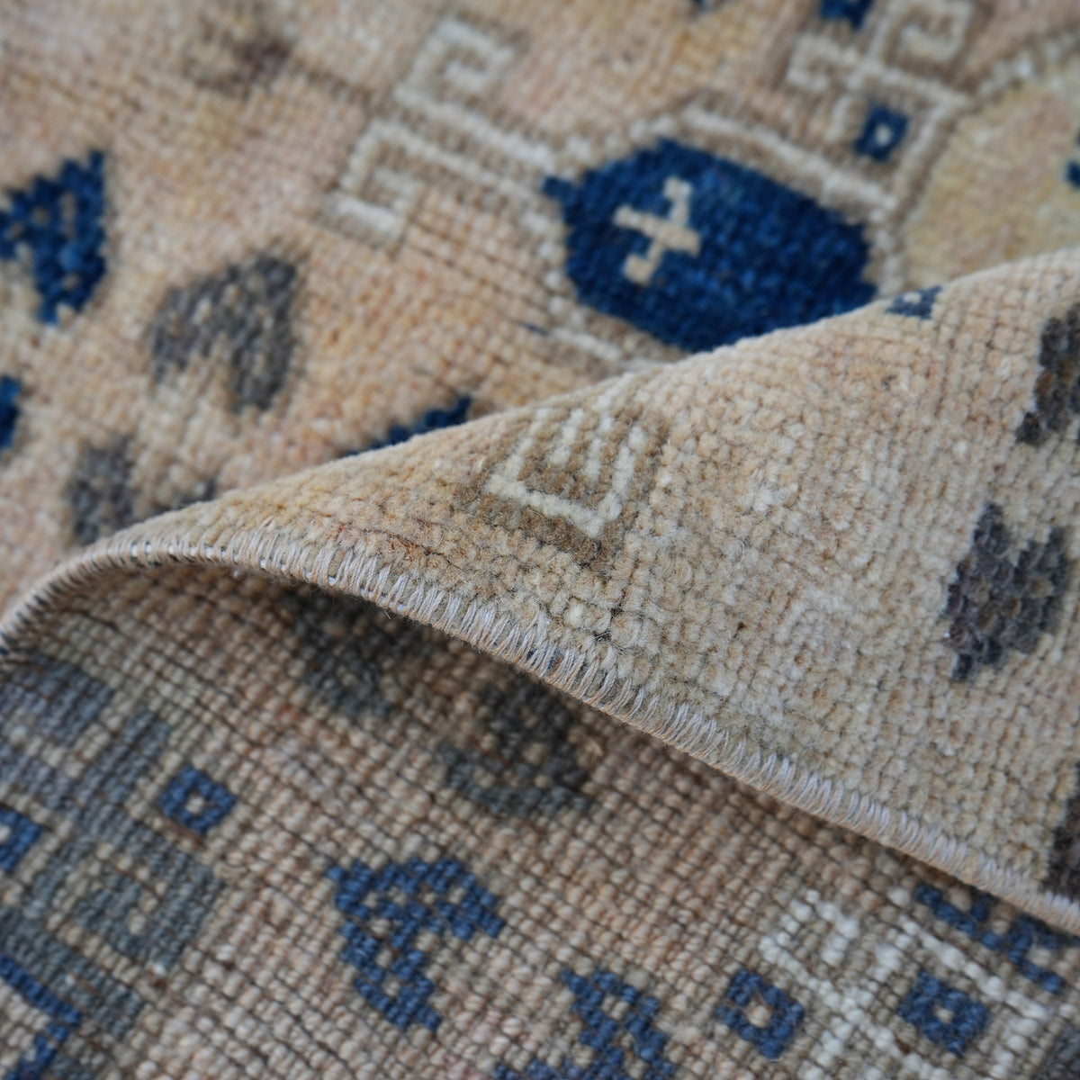 Additional view of the blue vintage Turkish area rug, hand-knotted in wool and cotton.