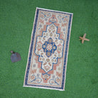 Blue 2' x 3' vintage area rug with traditional design, handmade in Turkey – Malcolm.