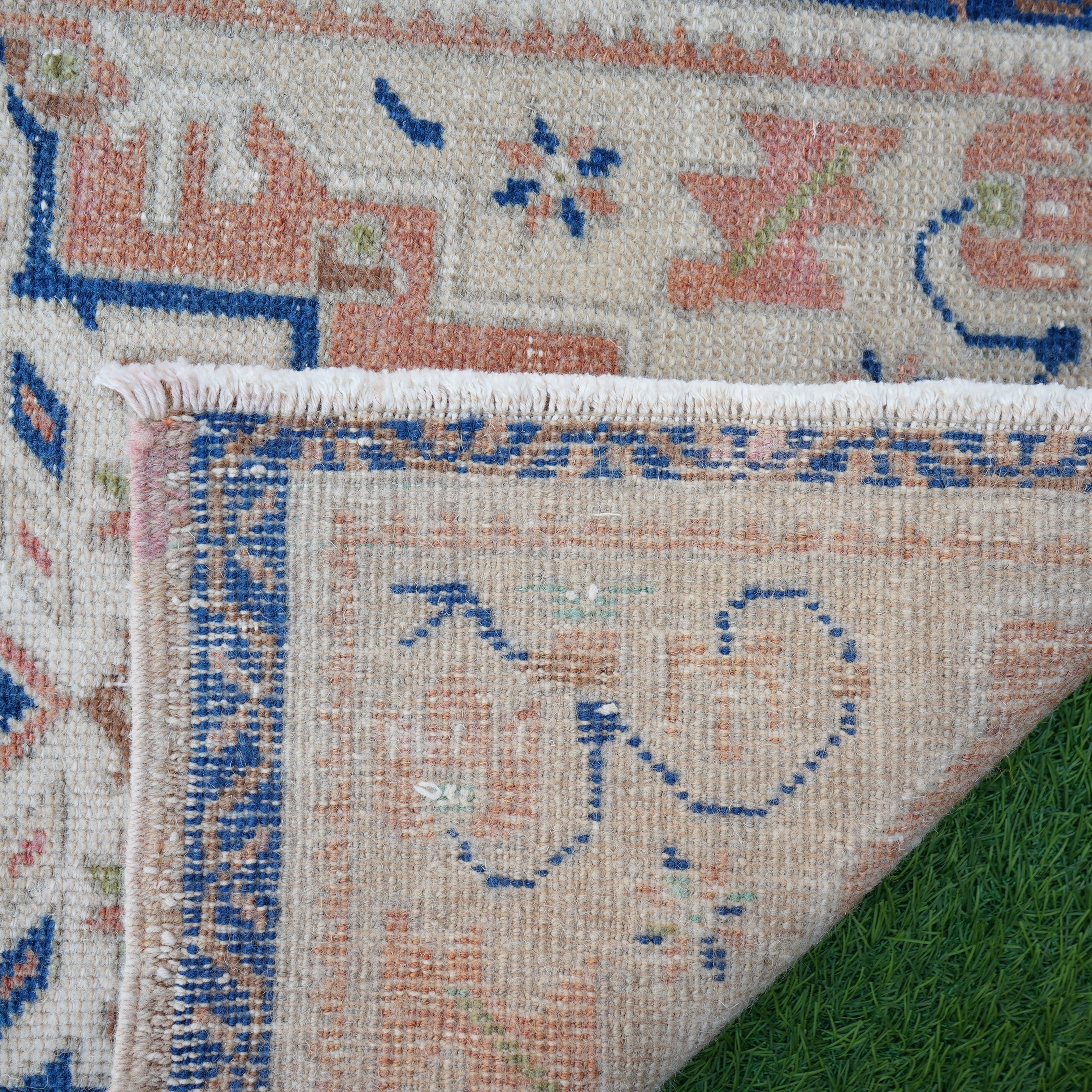 Additional view of the blue vintage Turkish area rug, hand-knotted in wool and cotton.