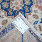 Blue 2' x 3' vintage Turkish area rug from the 1970s with traditional design.