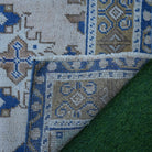 1970s blue vintage Turkish area rug with traditional design, hand-knotted weave and low pile.