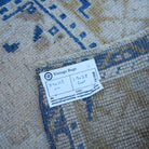 Blue 2' x 4' vintage Turkish area rug from the 1970s with traditional design.