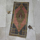 Pink 2' x 4' vintage area rug with traditional design, handmade in Turkey – Haley.