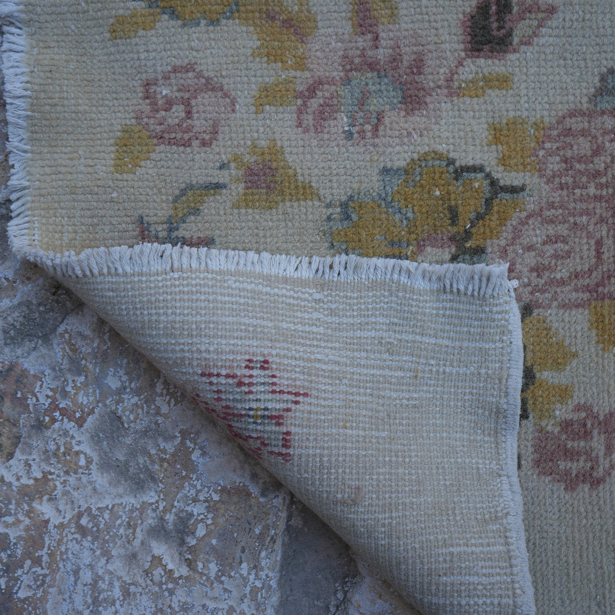 1970s beige vintage Turkish area rug with traditional design, hand-knotted weave and low pile.