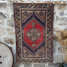 Red 4' x 6' vintage area rug with traditional design, handmade in Turkey – Berna.