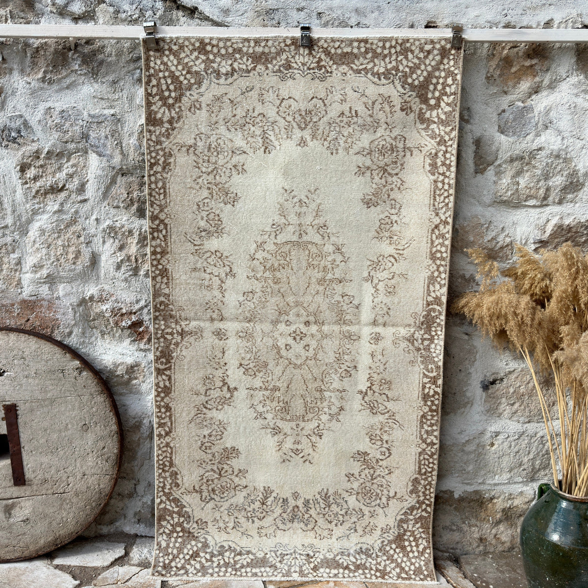 Beige 4' x 7' vintage area rug with medallion design, handmade in Turkey – Lark.
