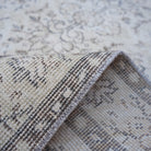 Additional view of the beige vintage Turkish area rug, hand-knotted in wool and cotton.