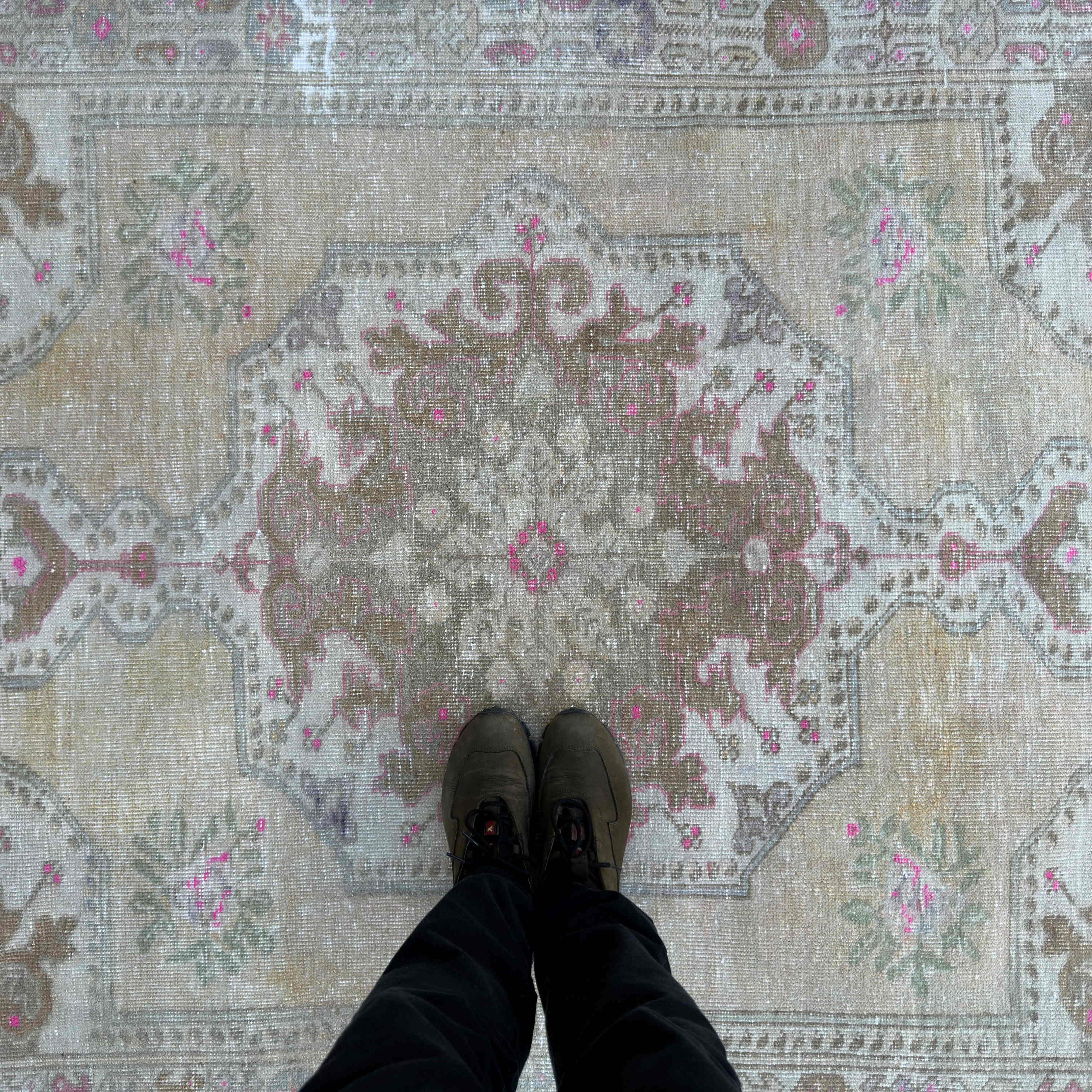 1970s pale yellow vintage Turkish area rug with neutral design, hand-knotted weave and low pile.