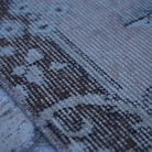Pink 4' x 7' vintage Turkish area rug in wool and cotton, shown on the floor.