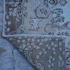 1970s pink vintage Turkish area rug with traditional design, hand-knotted weave and low pile.