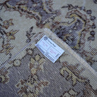Purple 4' x 7' vintage Turkish area rug from the 1970s with traditional design.
