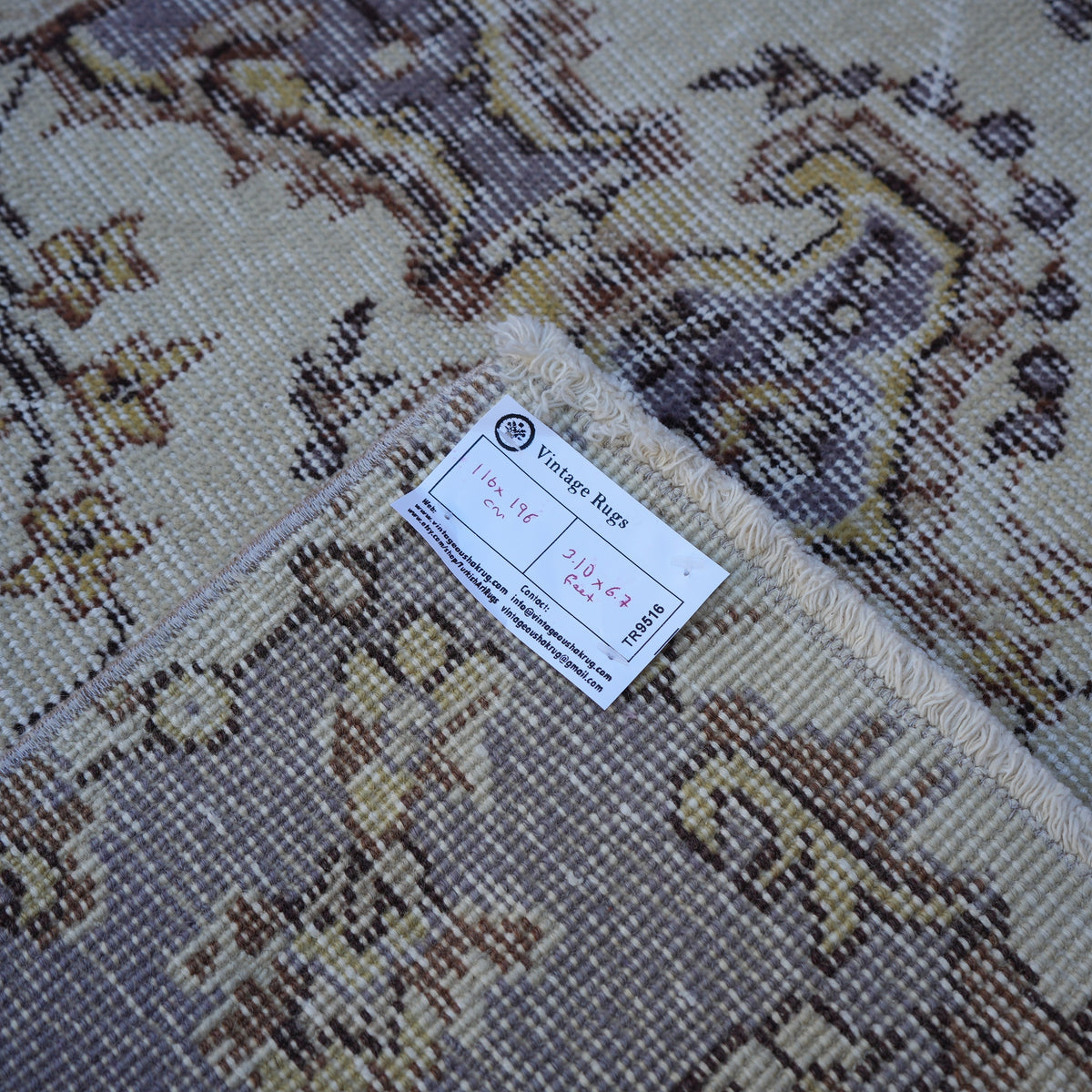 Purple 4' x 7' vintage Turkish area rug from the 1970s with traditional design.