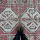 1970s red vintage Turkish area rug with traditional design, hand-knotted weave and low pile.