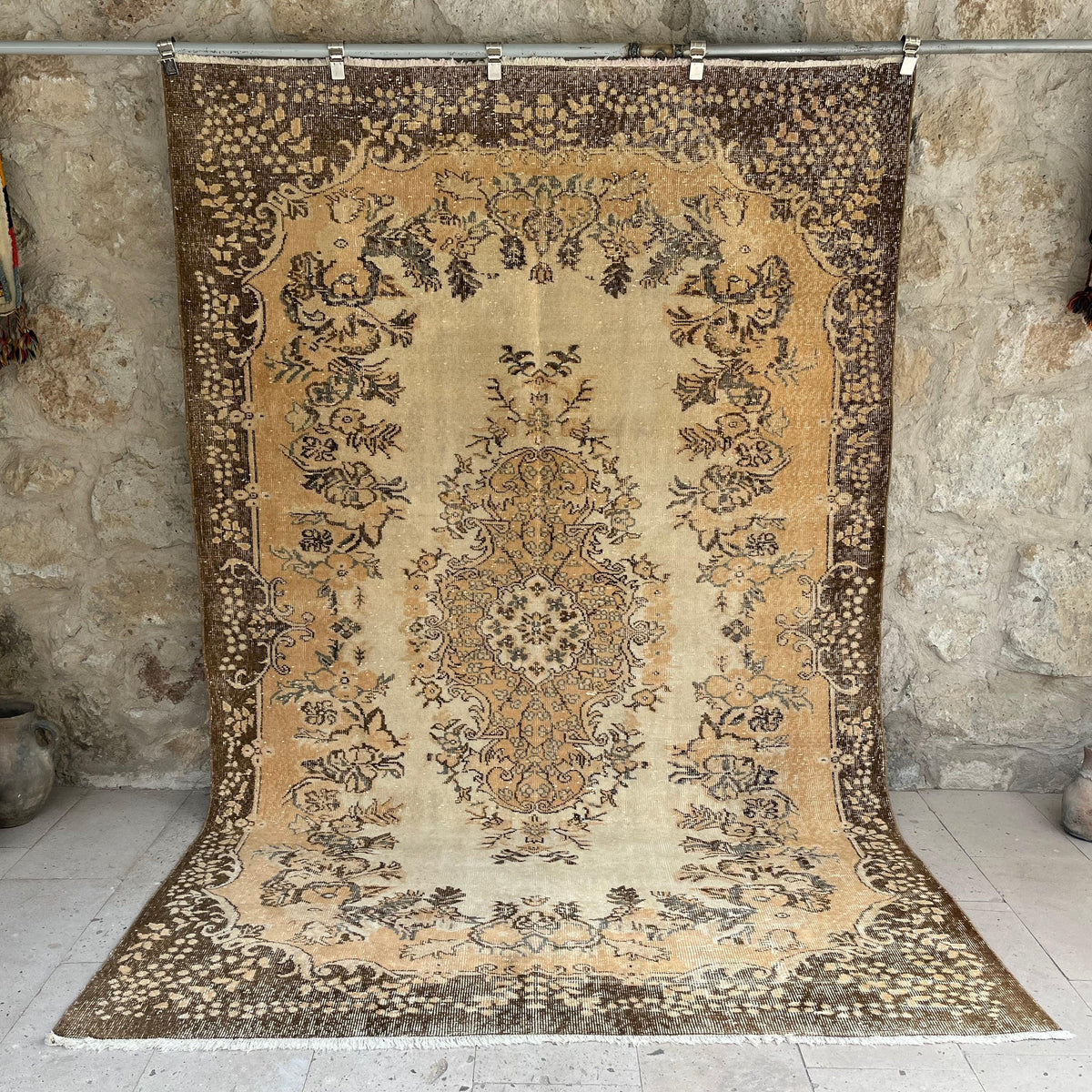 Brown 6' x 9' vintage area rug with medallion design, handmade in Turkey – Cady.