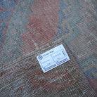 Beige 3' x 5' vintage Turkish area rug from the 1970s.