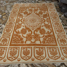 Pale Orange 6' x 9' vintage Turkish art deco rug in wool and cotton, shown on the floor.