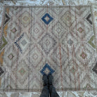 1970s beige vintage Turkish bohemian rug with traditional and neutral design, hand-knotted weave and low pile.