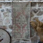 Red 3' x 5' vintage distressed rug with traditional design, handmade in Turkey – Rosa.