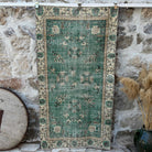 Green 4' x 6' vintage distressed rug with traditional design, handmade in Turkey – Gilbert.