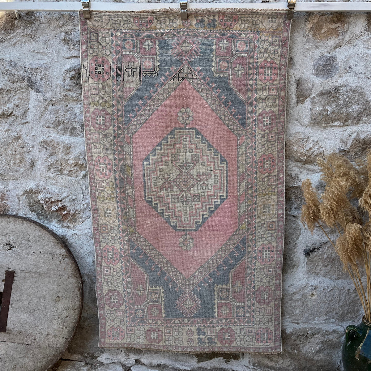Pink 4' x 6' vintage distressed rug with geometric design, handmade in Turkey – Winter.