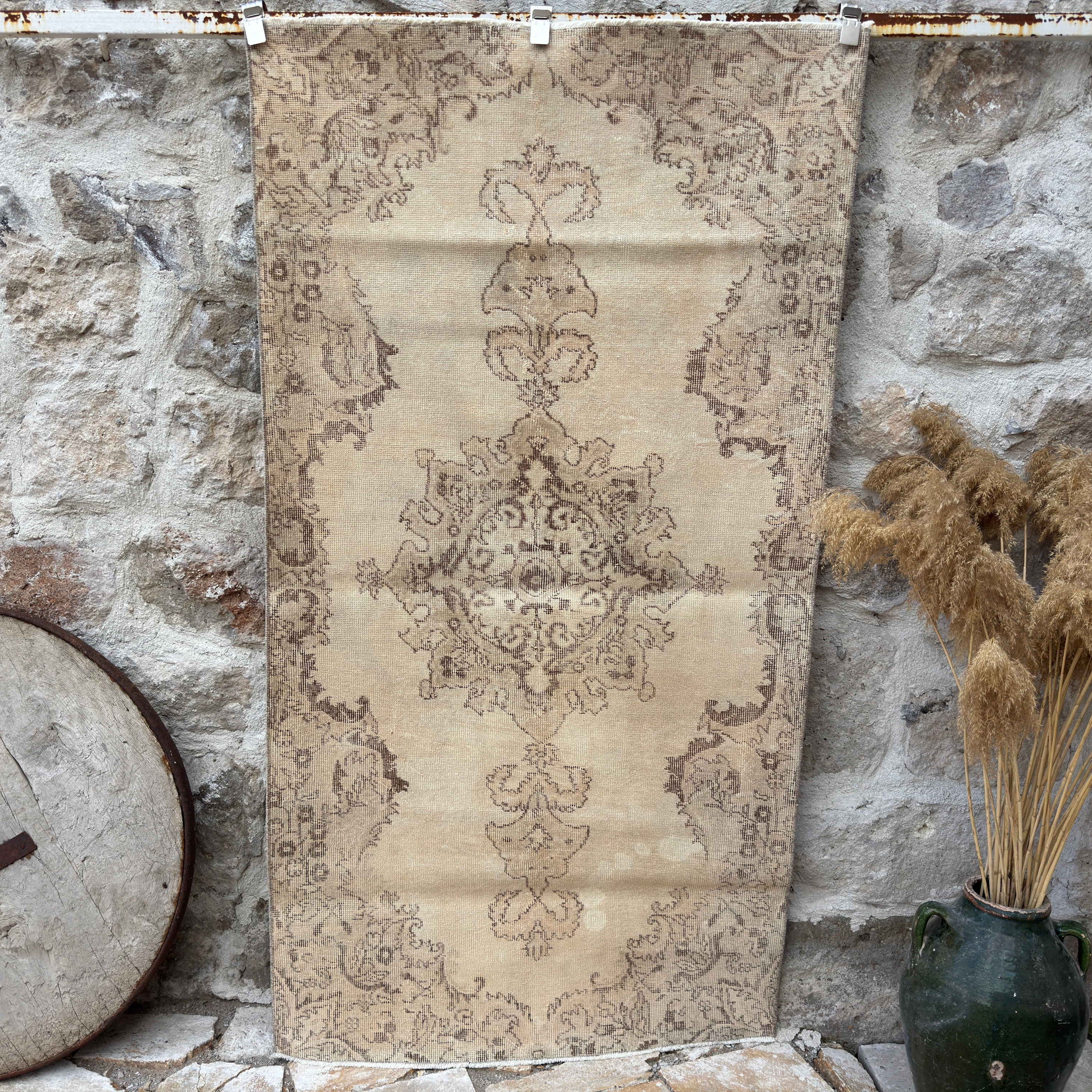 Beige 4' x 7' vintage distressed rug with neutral design, handmade in Turkey – Wally.