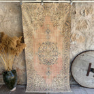 Pink 4' x 7' vintage distressed rug with traditional design, handmade in Turkey – Pepper.