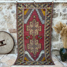 Red 4' x 8' vintage distressed rug with traditional design, handmade in Turkey – Idalina.