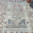 Blue 5' x 8' vintage Turkish distressed rug in wool and cotton, shown on the floor.