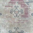 1970s blue vintage Turkish distressed rug with neutral design, hand-knotted weave and low pile.