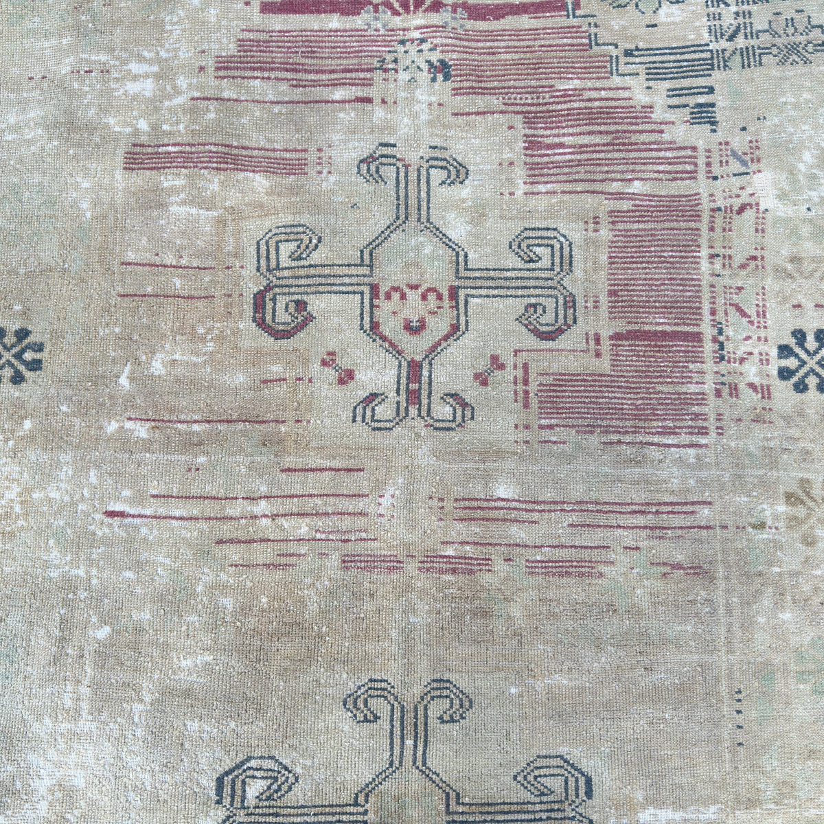 1970s blue vintage Turkish distressed rug with neutral design, hand-knotted weave and low pile.