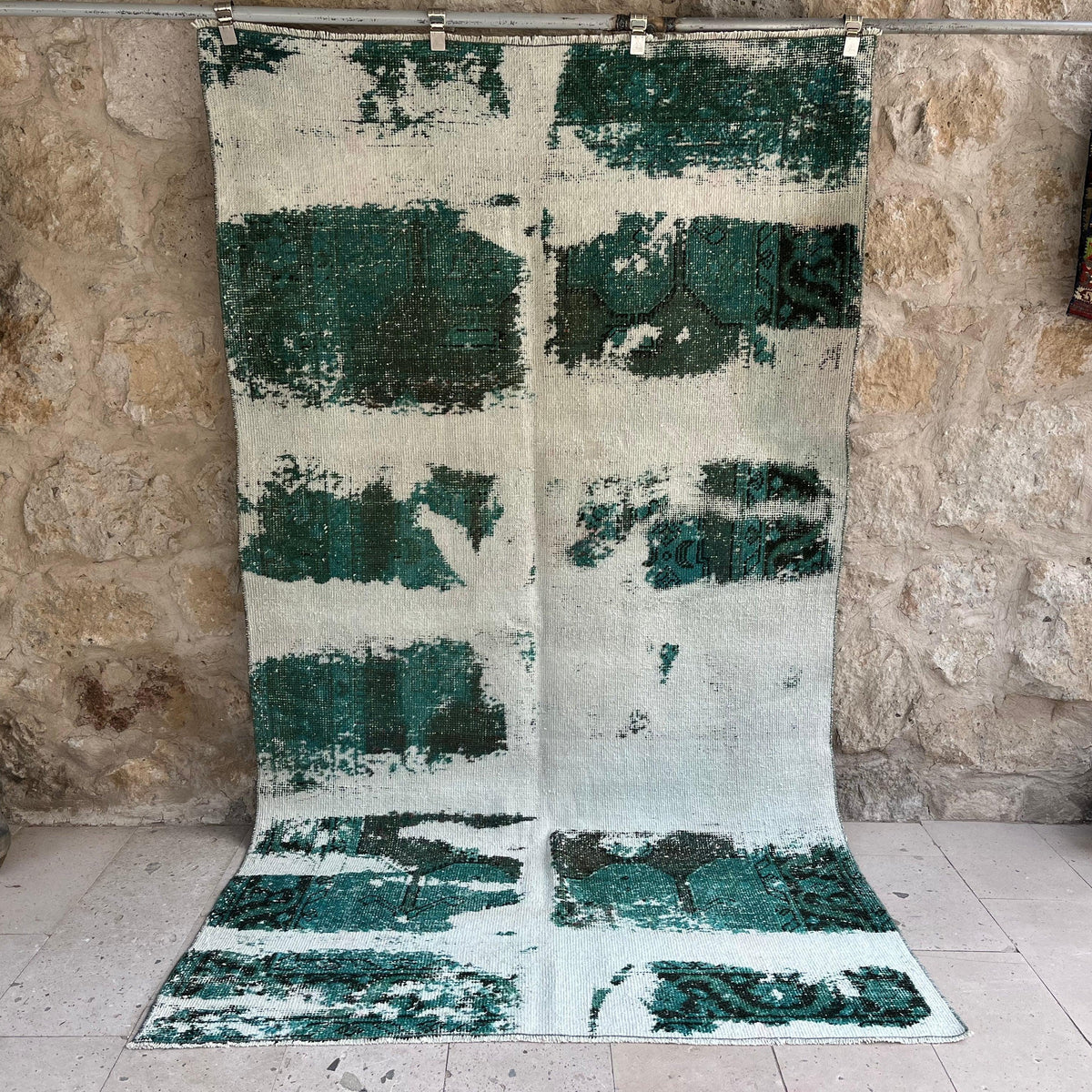 Green 5' x 9' vintage distressed rug with overdyed design, handmade in Turkey – Melinda.